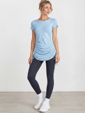 NWTS Foxy Jeans Heather blue longer length tee with side shirring. Sz Medium